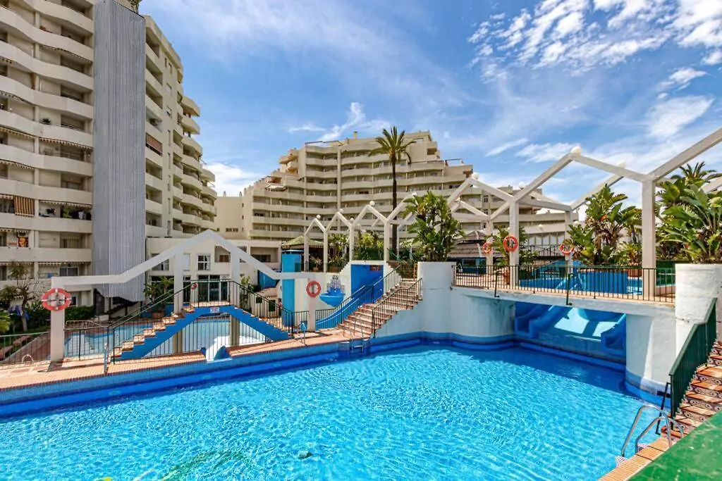 Apartamento 797 Holiday Rentals- Precioso piso con vistas al jardin en Benalbeach Benalmádena
